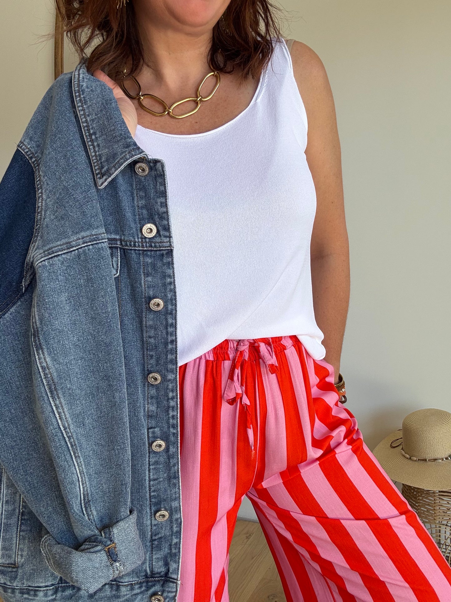 Pantalon fluide rayé orange et rose