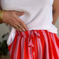 Pantalon fluide rayé orange et rose