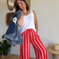 Pantalon fluide rayé orange et rose