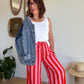 Pantalon fluide rayé orange et rose