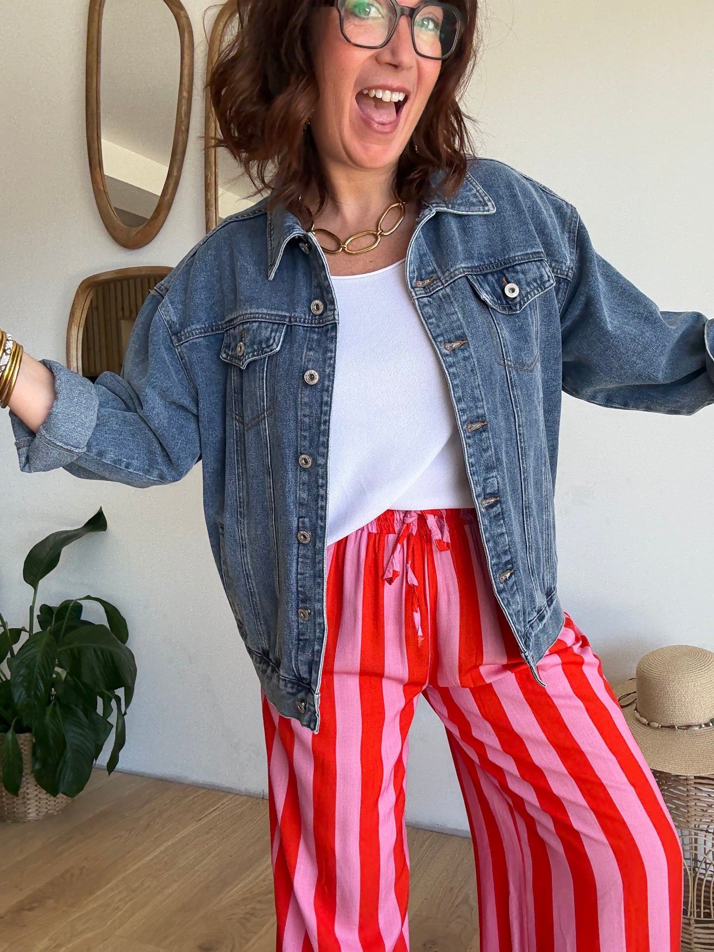 Pantalon fluide rayé orange et rose