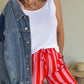 Pantalon fluide rayé orange et rose