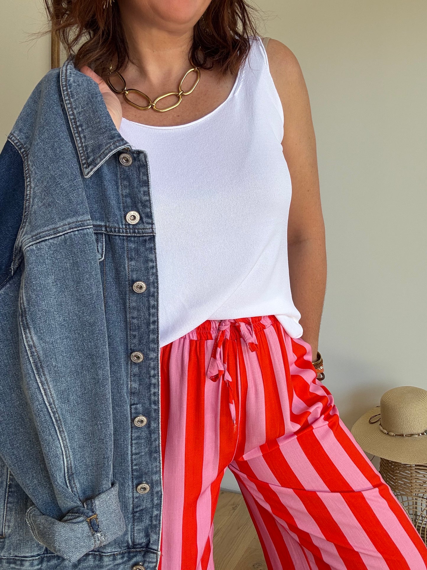 Pantalon fluide rayé orange et rose