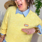 Pull good vibes jaune
